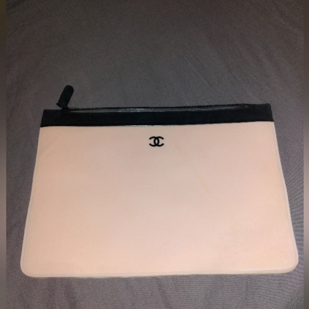 pink and black rubber swimsuit bag